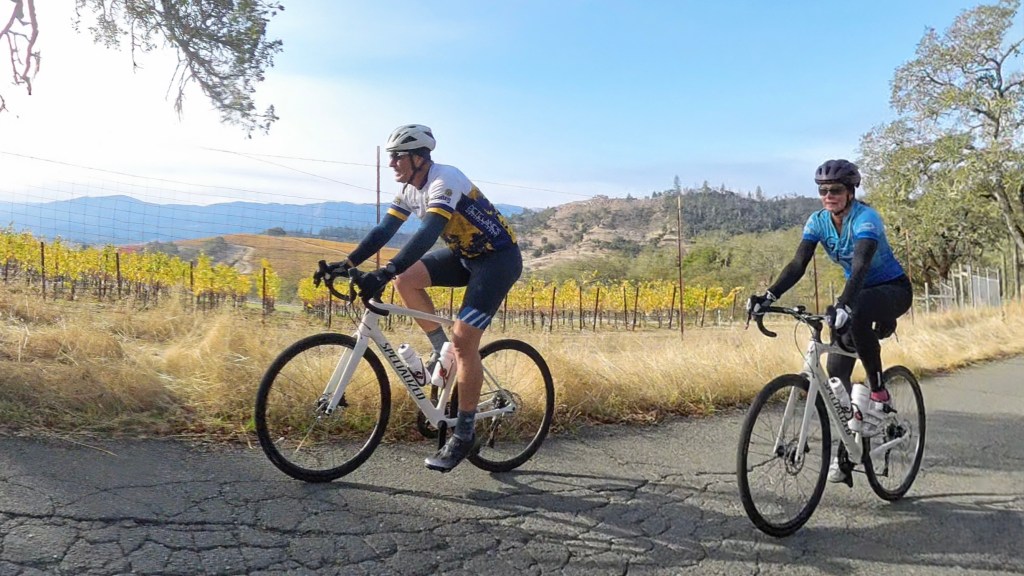 Cyclists riding in hills